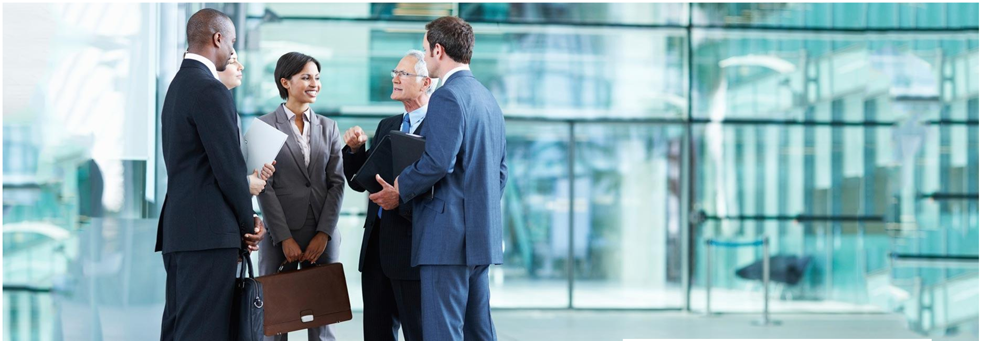 Management engaged in discussion outside the building with formal dressing